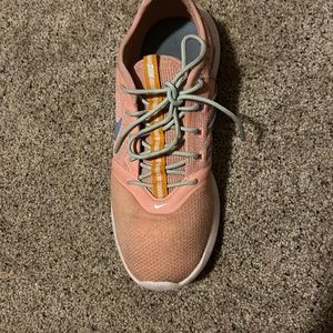 Nike orangish peachish color with light blue check in good shape just dirty